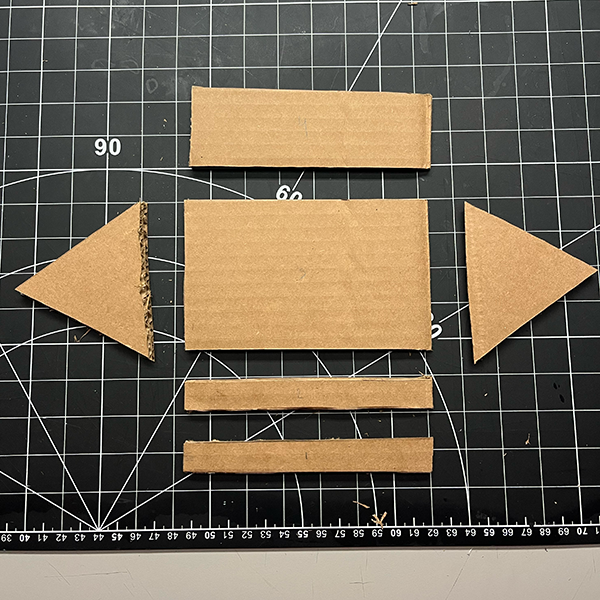 This is the view of a phone stand created from a different video tutorial. It highlights the variety of designs that can be achieved using guerrilla prototyping techniques. The focus is on functionality and ease of assembly rather than aesthetics, allowing for quick iterations and testing of concepts.